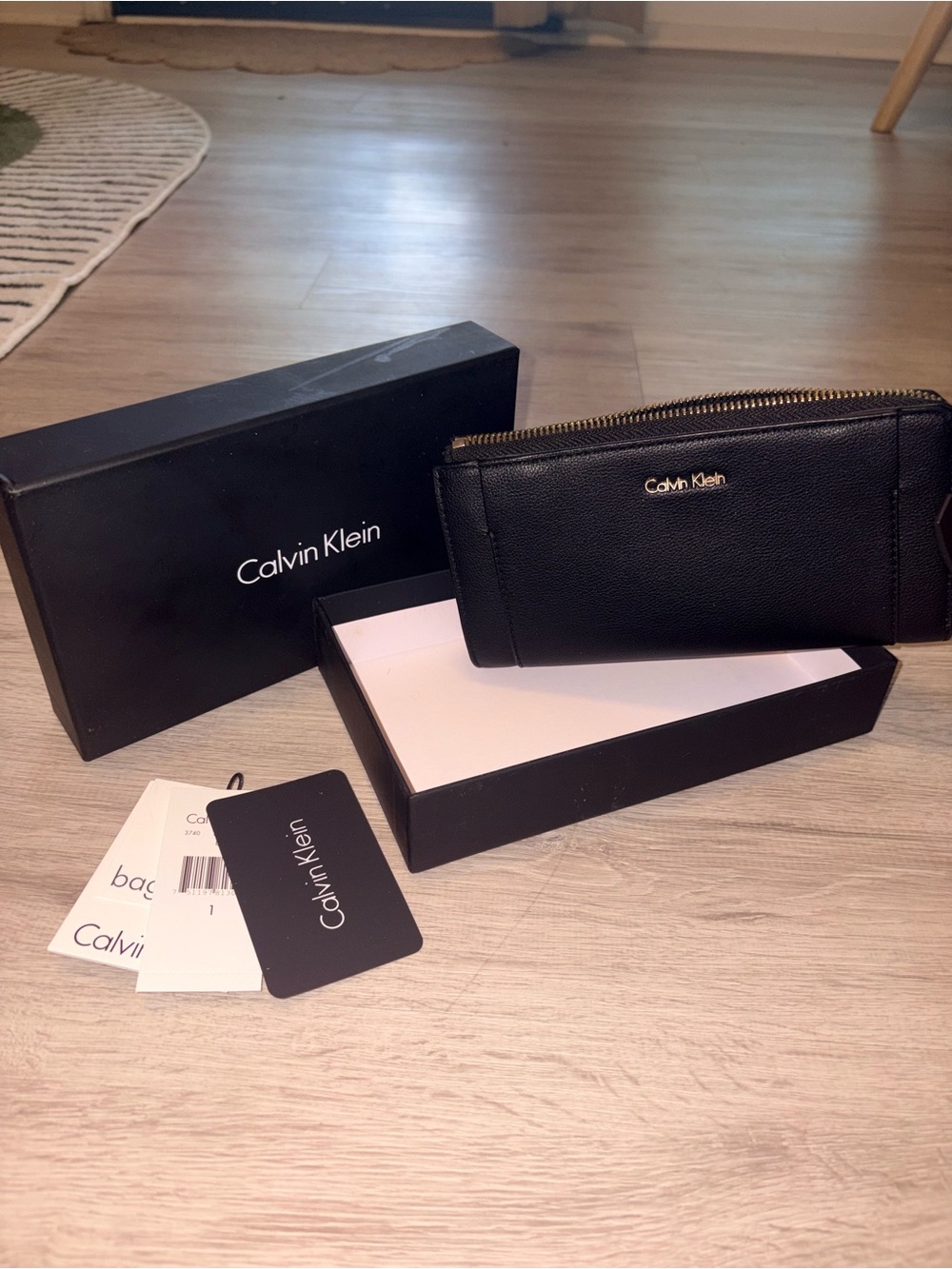 Calvin Klein Black Zip Wallet with Gold Logo